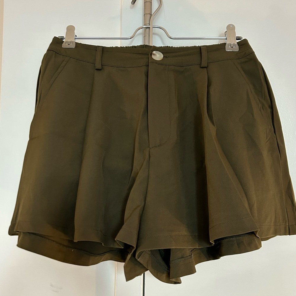 High waisted green flared shorts